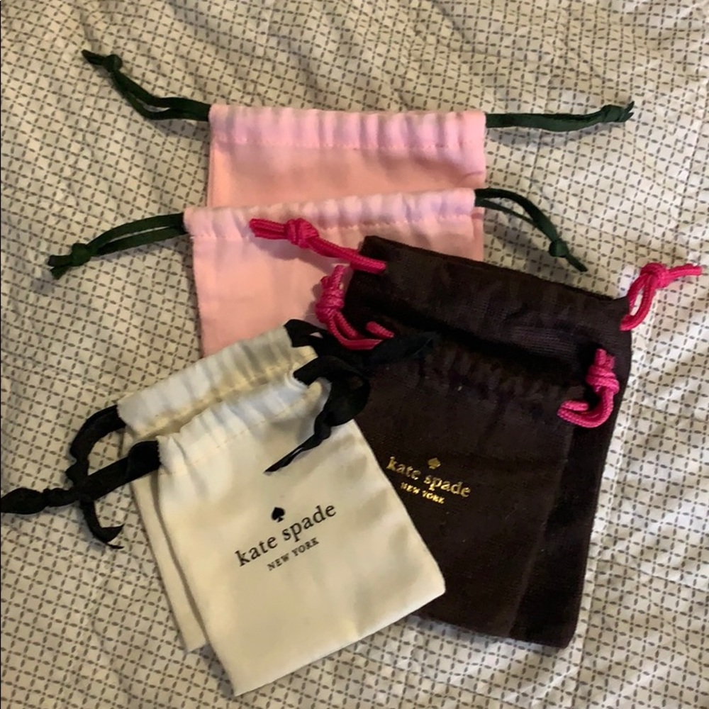 Multiple size and color Kate Spade pouches